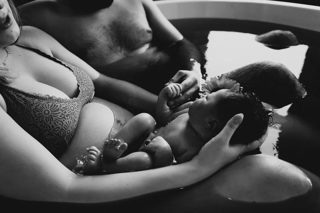 Water birth and first moments